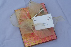 Three simple items create a unique gift: a beautiful pen and journal along with  gift card. Complete the package with a quote that expresses the sentiment you'd like to share or about the hobby.